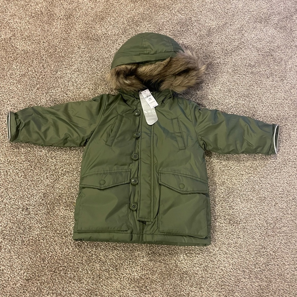 Brand New unworn Fax fur hooded winter coat by GAP. Toddler size 3T